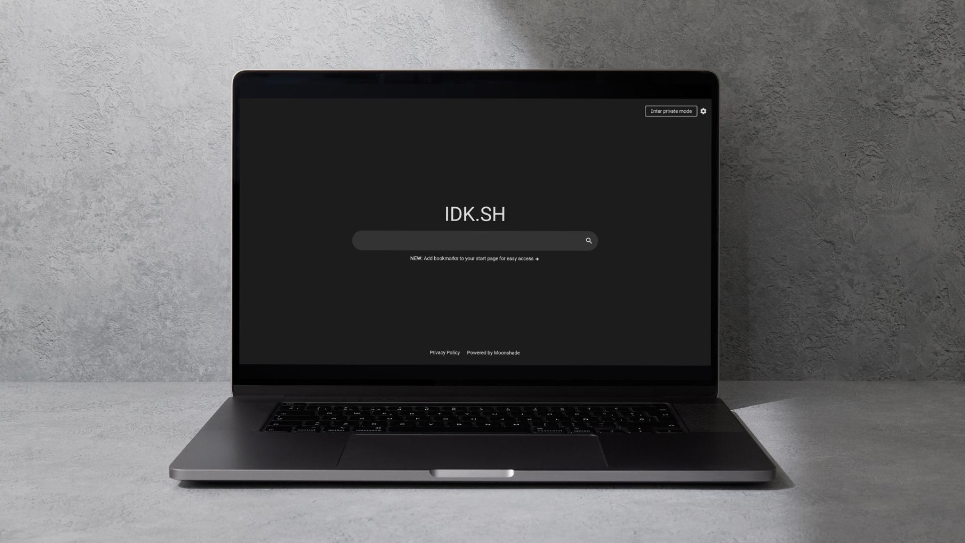 A laptop showing the homepage of idk.sh